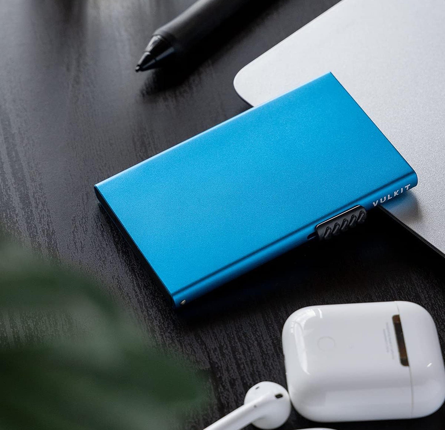 VULKIT Slim Metal Wallet with RFID Protection: Sleek metal wallet with a pop-up card feature, providing RFID protection to prevent unauthorized scanning of contactless cards.